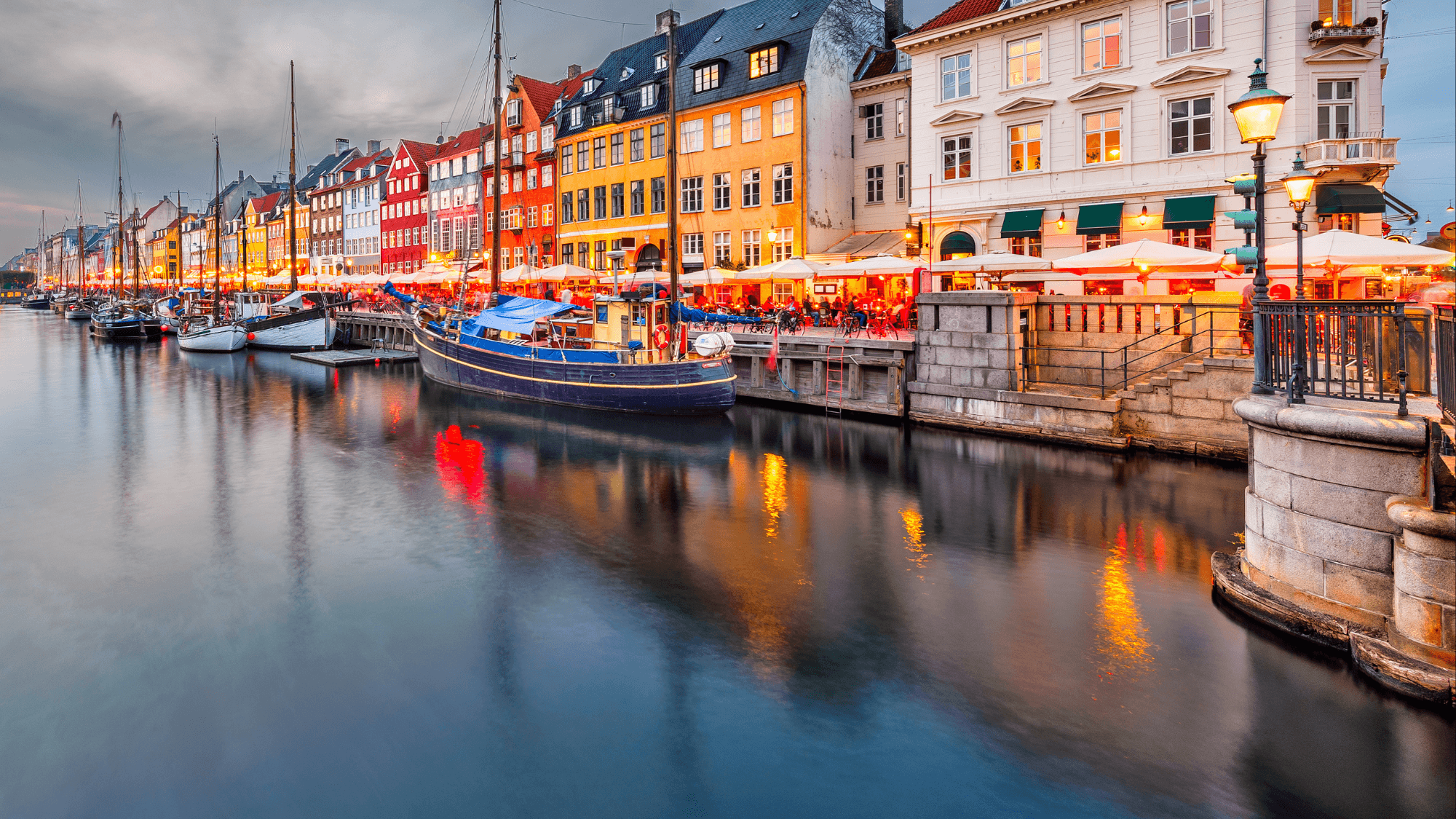 colored buildings in Denmark near the river