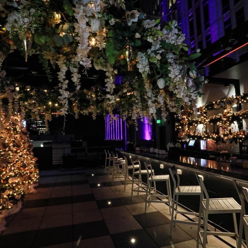 Novelty house rooftop bar at night 