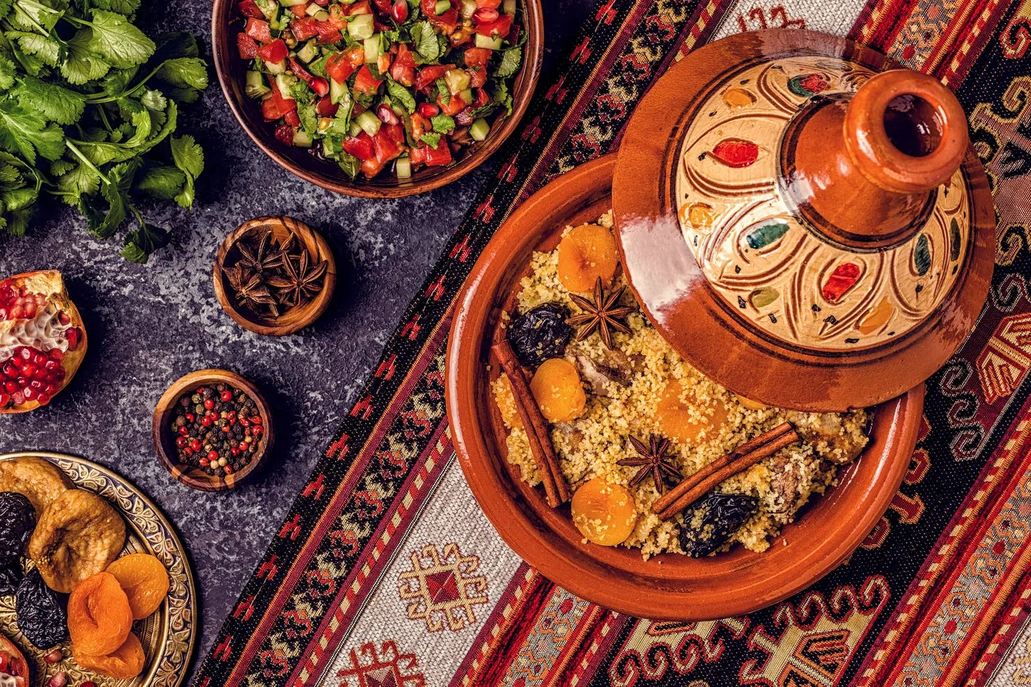 Traditional moroccan tajine of chicken with dried fruits and spices