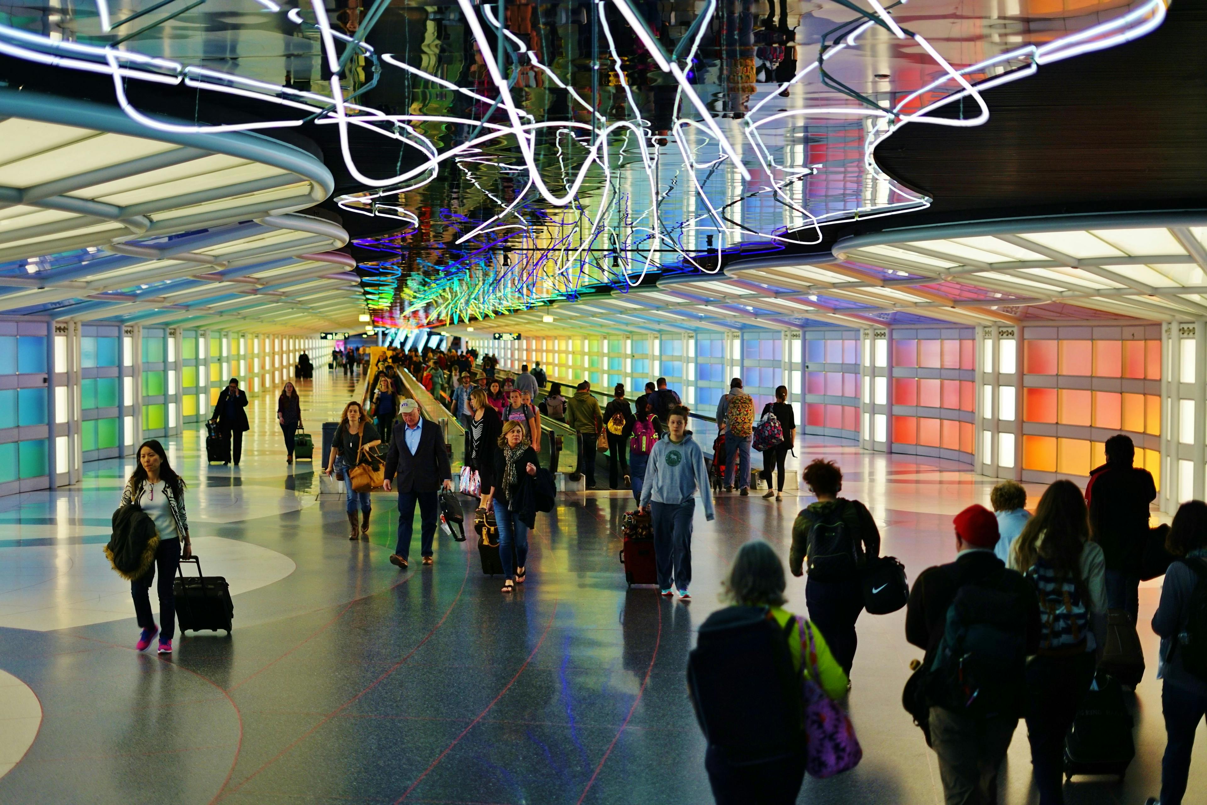 The colored electric neon tunnel The Sky Is the Limit at Chicago O'Hare International Airport (ORD) connects the B and C concourses at the United Airlines (UA)